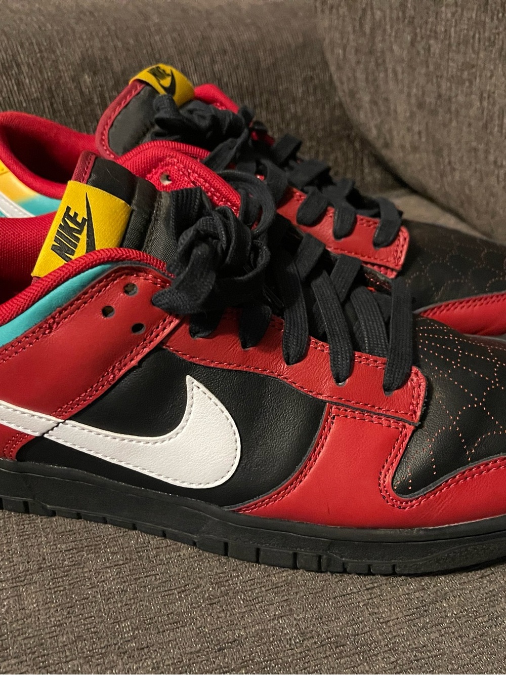 Nike Low-Top Sneakers in Red, Black, White & Yellow Accent